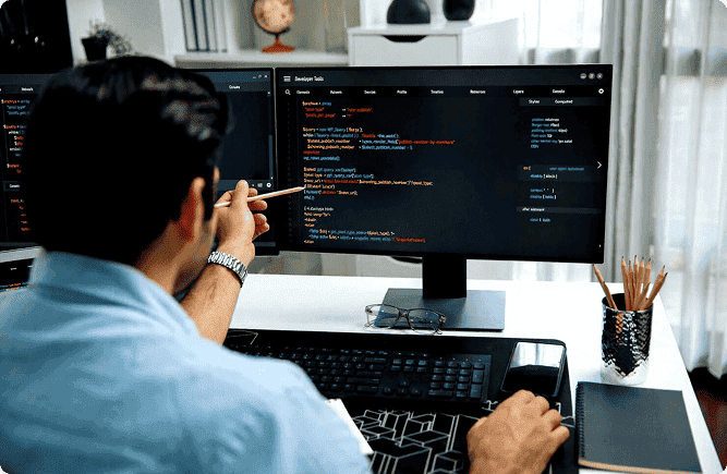Developer coding web applications using PHP technology